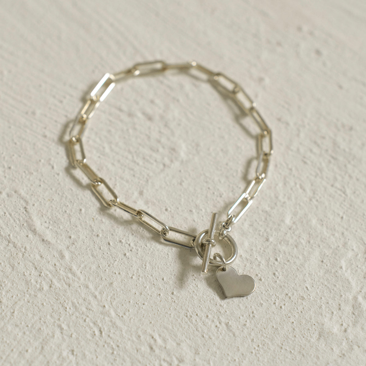925 Sterling Silver Tiny Heart Charm on a Bold Paper Clip Bracelet with Toggle Closure