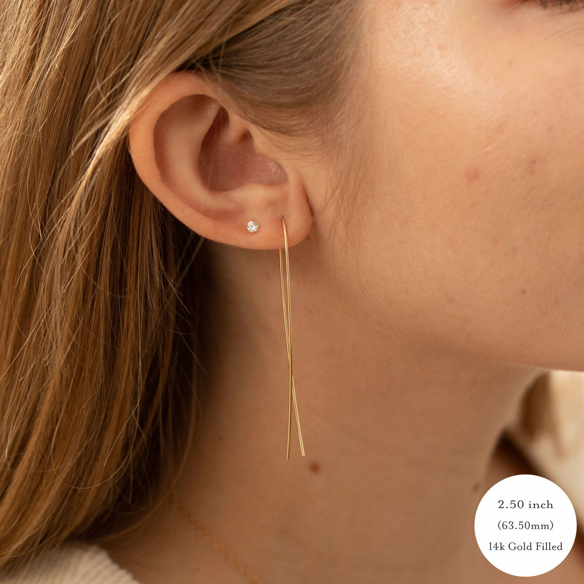 2.50 inch, 63.50mm, 14K Gold Filled Jesus Fish Threader Earrings on a model, Laurane Elisabeth
